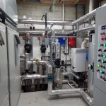 Hybrid Heating System with air source heat pumps and commercial boiler